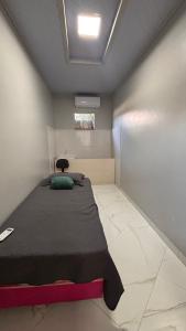 Postel nebo postele na pokoji v ubytování espaço R&H + 11 fotografií