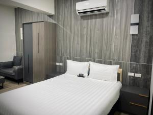 Postel nebo postele na pokoji v ubytování Shigang Homestay市港行旅