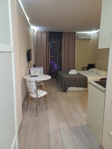 TV a/nebo společenská místnost v ubytování Orbi Sea Towers Batumi on Khimshiashvili 15