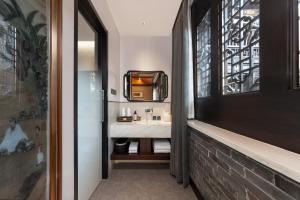 Kuchyň nebo kuchyňský kout v ubytování Tao Hotel