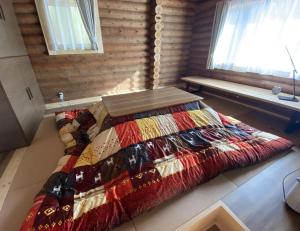 Postel nebo postele na pokoji v ubytování Cottage Jokigen B