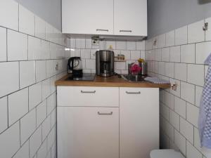 Kuchyň nebo kuchyňský kout v ubytování Ferienhaus am Oase am Vilzsee