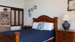 Ένα ή περισσότερα κρεβάτια σε δωμάτιο στο Sonoran Sky