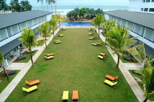 Vrt pred nastanitvijo Coco Royal Beach Resort Pvt Ltd