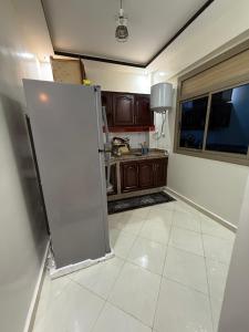 Kuchyň nebo kuchyňský kout v ubytování Cozy Apartment In Central Beni mellal