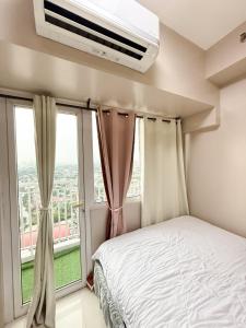 Ένα ή περισσότερα κρεβάτια σε δωμάτιο στο Cozy1BR condo in Mezza 2 Qc with wifi and netflix