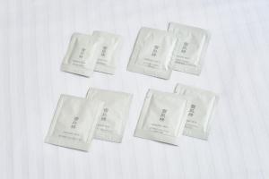 a group of white napkins sitting on a table at Hotel Villa Fontaine Tokyo-Hamamatsucho in Tokyo