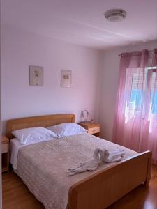 Postel nebo postele na pokoji v ubytování Apartment Marijana