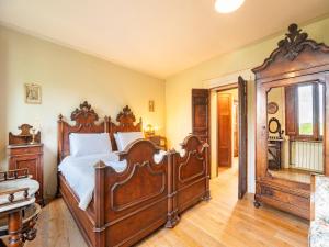 Postel nebo postele na pokoji v ubytování Villa in Cortona with pool