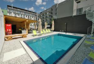 Πισίνα στο ή κοντά στο eFi Palace Hotel