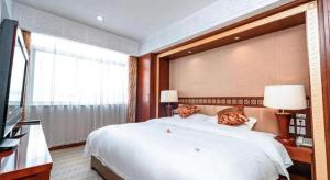 Μια τηλεόραση ή/και κέντρο ψυχαγωγίας στο Golden Spring Hotel Lijiang
