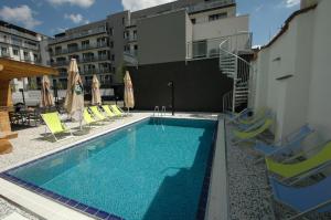 Πισίνα στο ή κοντά στο eFi Palace Hotel