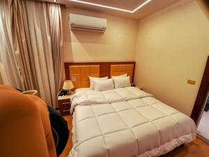 Letto o letti in una camera di THree PYramiDs & SPhinX HoTeL