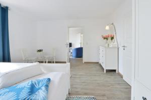 Postel nebo postele na pokoji v ubytování Ferienwohnung Boddenzander