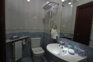 Ein Badezimmer in der Unterkunft Pension Alameda
