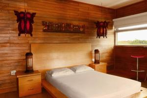 Letto o letti in una camera di Hotel Portobelo Guatape