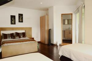 Letto o letti in una camera di Hotel Portobelo Guatape