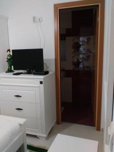 A television and/or entertainment centre at Villa Avdira