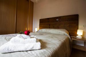Posteľ alebo postele v izbe v ubytovaní Apartamentos Albero