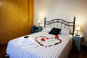 Posteľ alebo postele v izbe v ubytovaní Apartamentos Albero