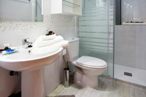 Ett badrum på Apartamentos Albero