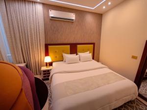 Letto o letti in una camera di THree PYramiDs & SPhinX HoTeL