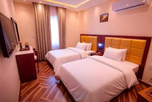 Letto o letti in una camera di THree PYramiDs & SPhinX HoTeL