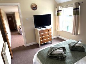 TV a/nebo společenská místnost v ubytování The Star Inn Weaverthorpe