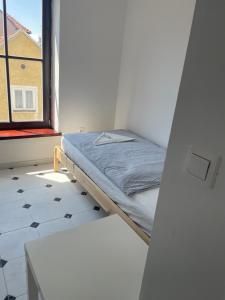 Postel nebo postele na pokoji v ubytování Residence Meljska