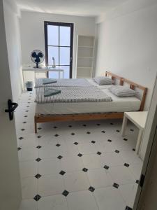 Postel nebo postele na pokoji v ubytování Residence Meljska