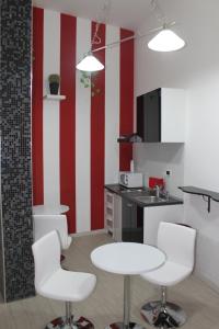 Kuchyňa alebo kuchynka v ubytovaní Central Hostel Milano