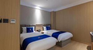 Super 8 Hotel Beijing South Railway Station Majiabao Metro Station客房内的一张或多张床位