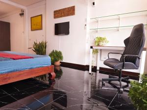 Μια τηλεόραση ή/και κέντρο ψυχαγωγίας στο Old Spice 4 Downtown Serenity Luxurious Oasis BKK