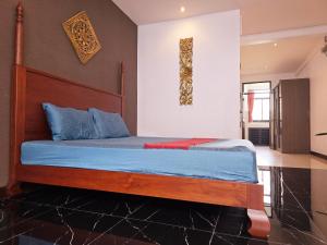 Ένα ή περισσότερα κρεβάτια σε δωμάτιο στο Old Spice 4 Downtown Serenity Luxurious Oasis BKK