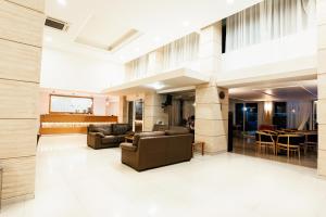 
The lobby or reception area at Hotel Riviera
