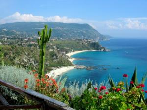 a view of a beach and the ocean at Affittacamere Diavin in Vibo Valentia