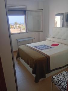 Ένα ή περισσότερα κρεβάτια σε δωμάτιο στο Apartamento Adra