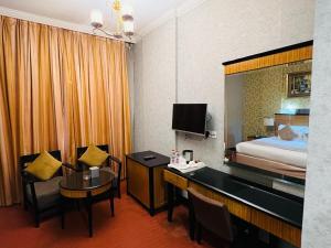 CREEK Hotel客房内的一张或多张床位