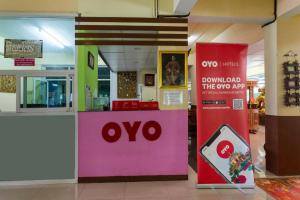 a store with a omo sign in a mall at OYO 75356 Thipsiri Lodge in Chiang Mai +65 photos