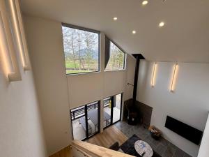 an overhead view of a staircase in a house at Kinagashi Happo Chalet East in Hakuba
