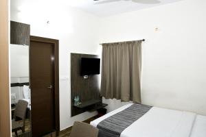 Μια τηλεόραση ή/και κέντρο ψυχαγωγίας στο Hotel JP Grand