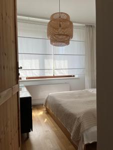 Posteľ alebo postele v izbe v ubytovaní Apartamenty Miły - Gdynia Redłowo