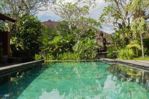 Bazén v ubytování Bramasa Ubud Guest House nebo v jeho okolí