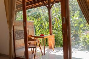 Zahrada ubytování Bramasa Ubud Guest House