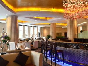 Posezení v ubytování Days Hotel & Suites Hengan Chongqing