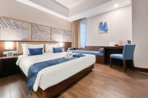 Katil atau katil-katil dalam bilik di @HOM Premiere Timoho +27 gambar