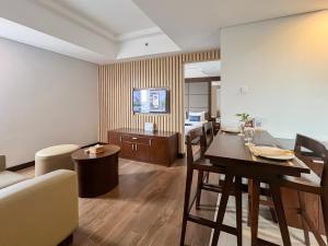 Een TV en/of entertainmentcenter bij @HOM Premiere Timoho
