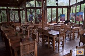Um restaurante ou outro lugar para comer em Lendas do Capão Pousada