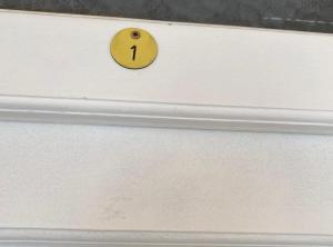 a drawer with a smiley face drawn on it at Villa Apartments Babaja in Omiš