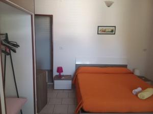 Postel nebo postele na pokoji v ubytování B&B La Pineta